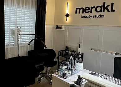 Relaxing treatment room at Meraki Beauty Studio, Liverpool, England, GB with cozy decor and makeup tools.