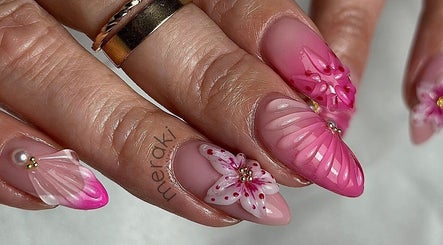 Intricate floral nail art at Meraki Beauty Studio in Liverpool, England, GB showcasing pink petal designs.