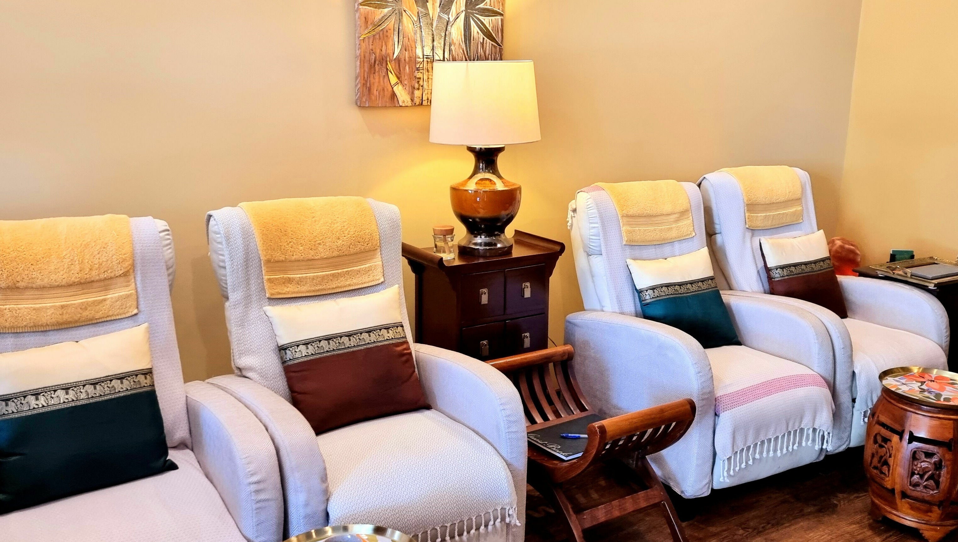 Comfortable spa chairs at Natural Palm Day Spa, Cairns City, Queensland, AU offering a serene ambiance.