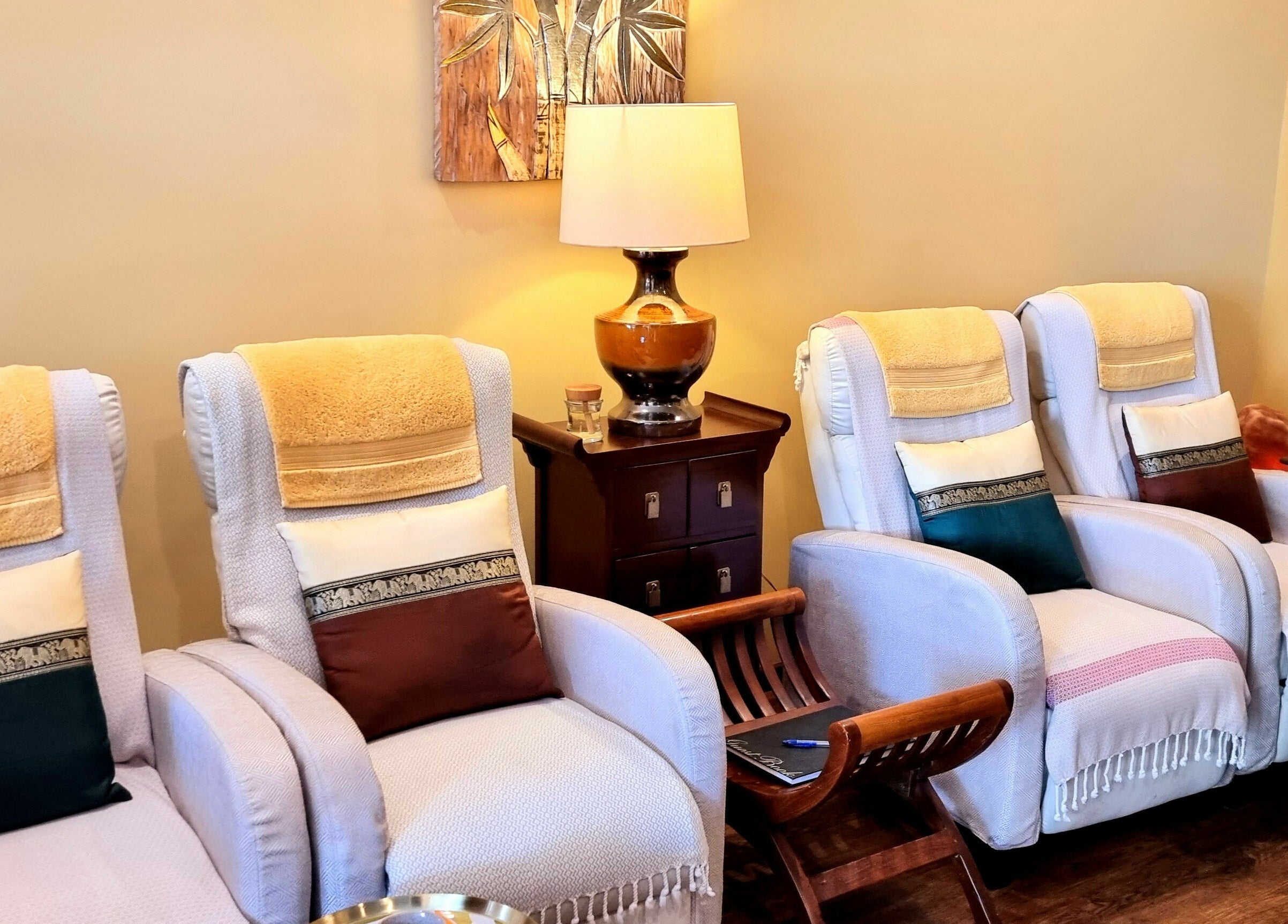 Comfortable spa chairs at Natural Palm Day Spa, Cairns City, Queensland, AU offering a serene ambiance.