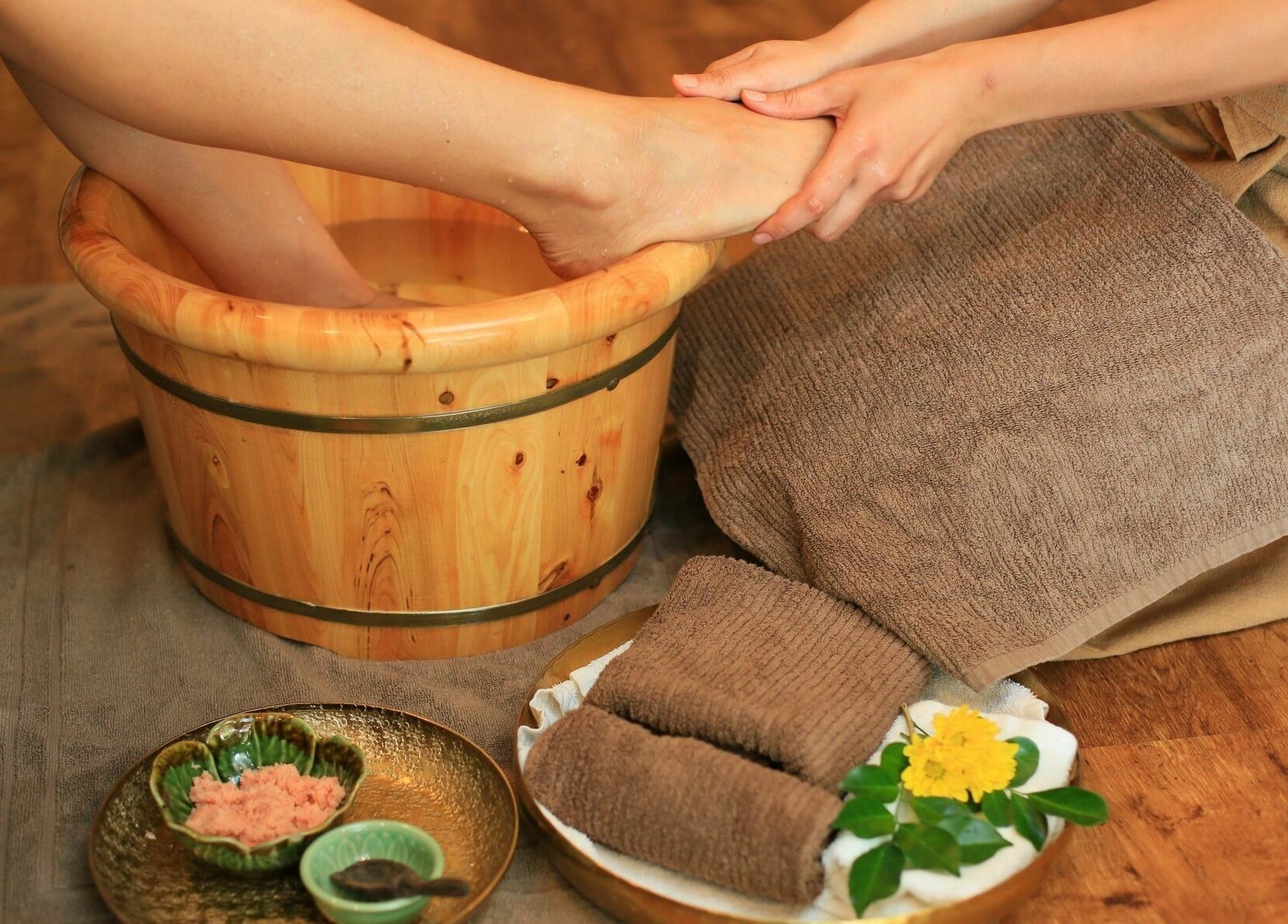 Relaxing foot soak experience at Natural Palm Day Spa, Cairns City, Queensland, AU with soothing decor.