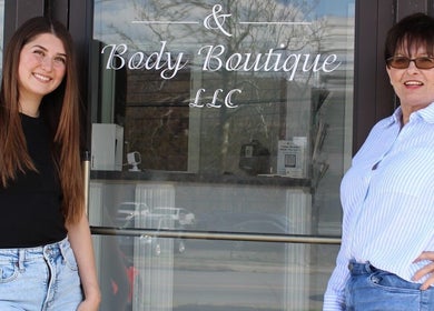 Owners at The Skin Bar and Body Boutique LLC entrance in Johnson City, Tennessee, US.