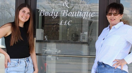 Owners at The Skin Bar and Body Boutique LLC entrance in Johnson City, Tennessee, US.