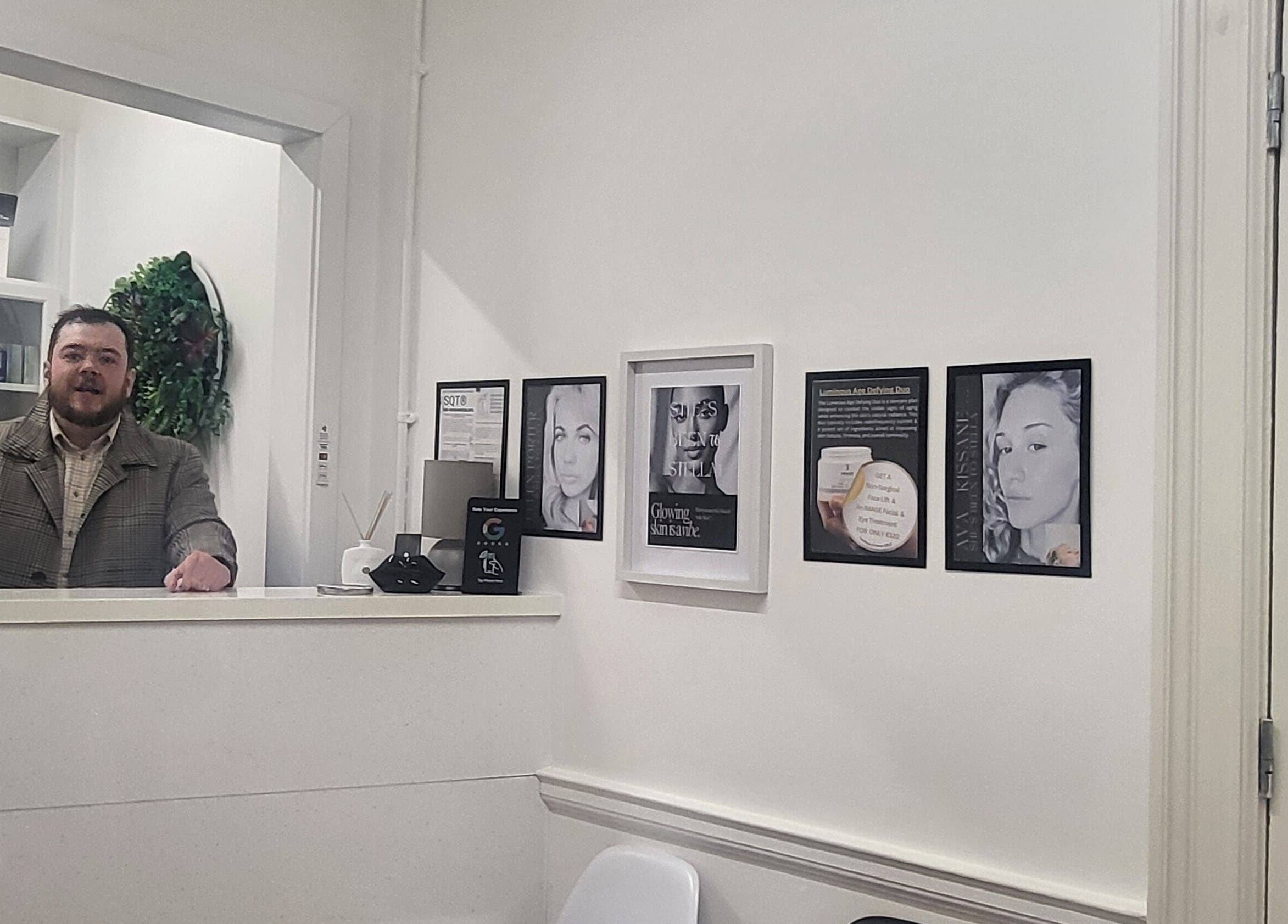 Reception area at Stella Medical Aesthetics, Dublin, County Dublin, IE with framed skincare posters.