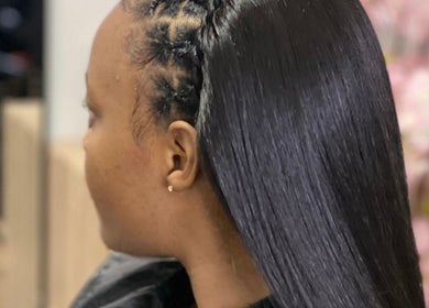Elegant hair styling at Vanity Beauty Bar, Pretoria, Gauteng, ZA, showcasing smooth, sleek, straight hair.