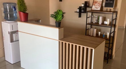 Reception area at IKIGAI SKIN AND BEAUTY SPA in Gaborone, Gaborone City, BW, showcasing elegant decor and products.