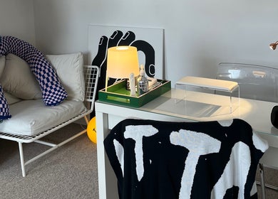 Relaxing corner at Samanails, Broughshane, Northern Ireland, GB with stylish decor, cozy seating, and ambient lighting.