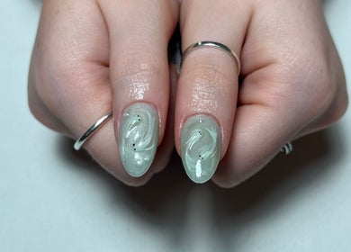 Elegant nail design at Samanails, Broughshane, Northern Ireland, GB with glossy swirl pattern.