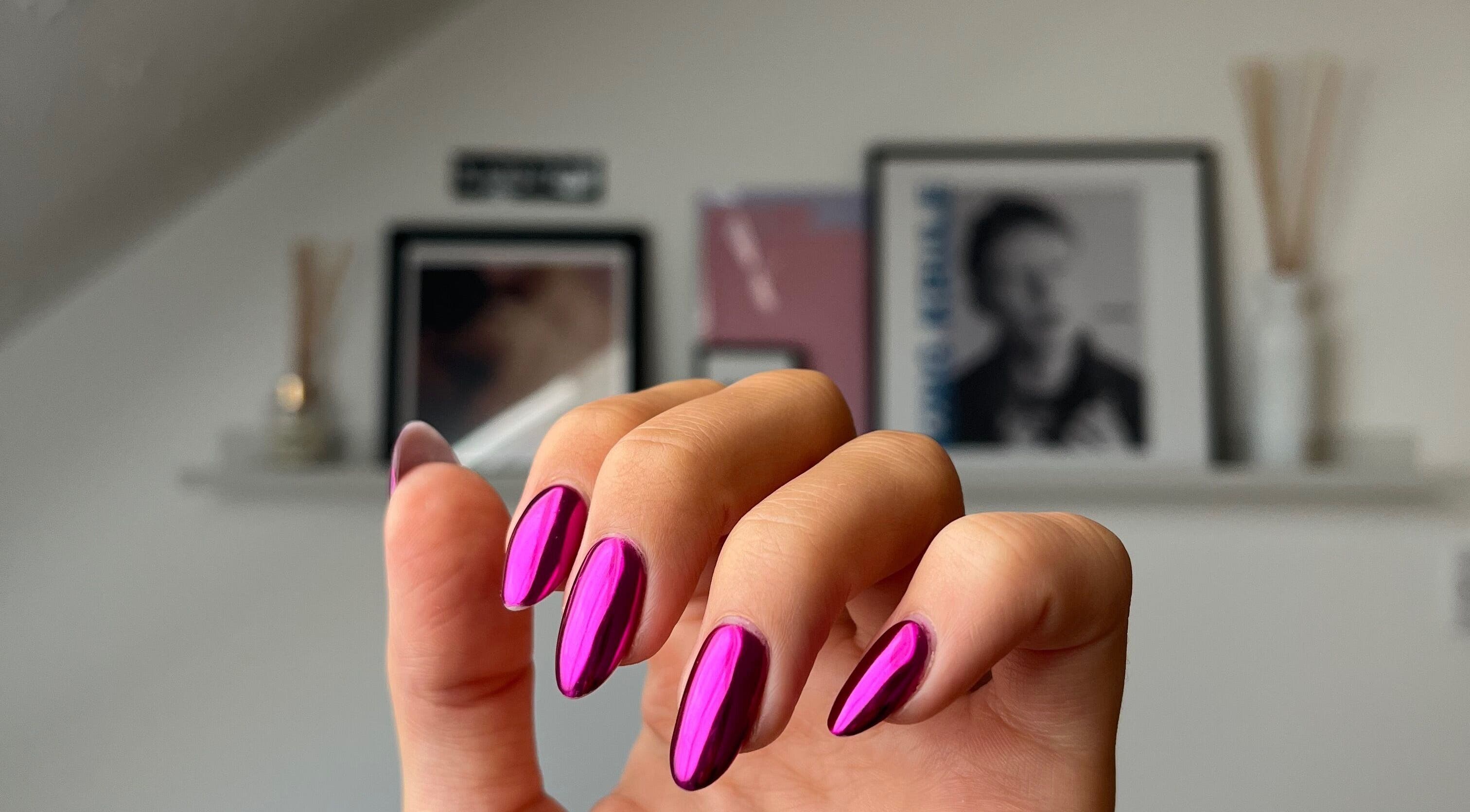 Glossy magenta nails at Samanails, Broughshane, Northern Ireland, GB create a stunning and stylish look.