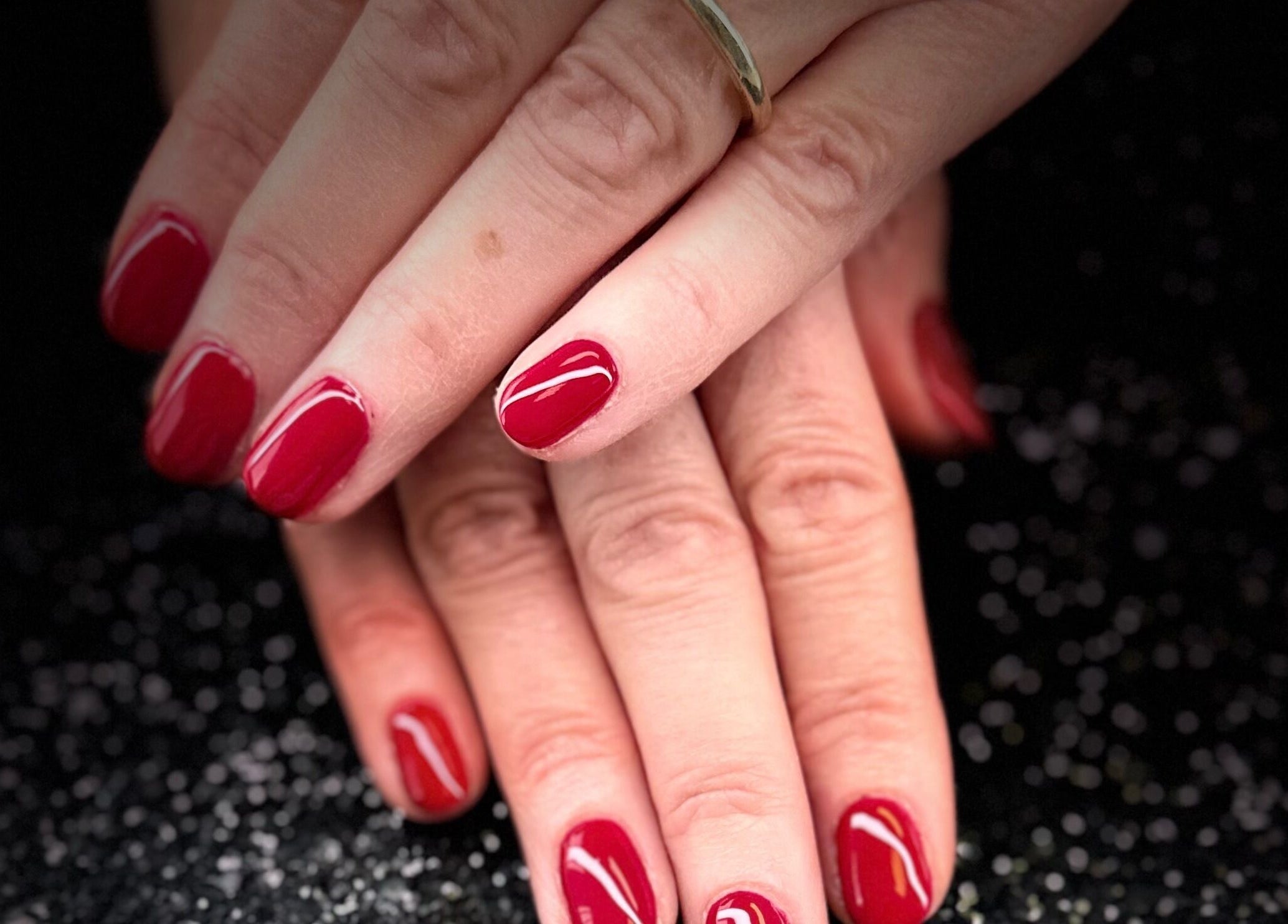 Elegant red nails at Nazia Sandhu - Permanent Makeup and Nails in Wokingham, England, GB.