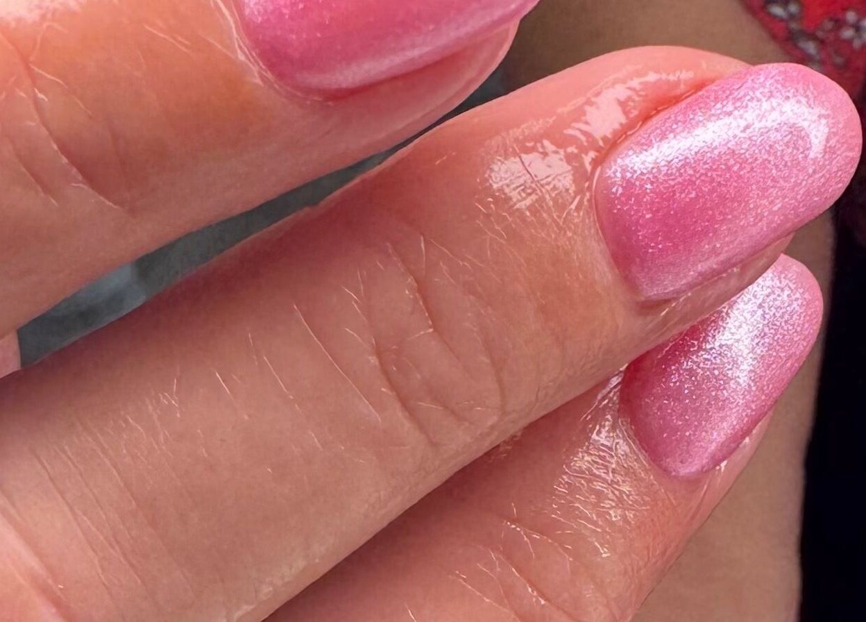 Elegant pink nails with shimmer at Nazia Sandhu - Permanent Makeup and Nails, Wokingham, England, GB.