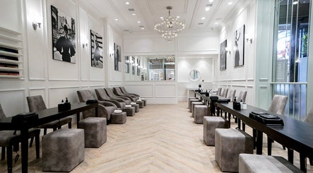 Elegant interior of Naked Botanica by The Art of Nails Newmarket in Auckland, NZ featuring sleek seating.
