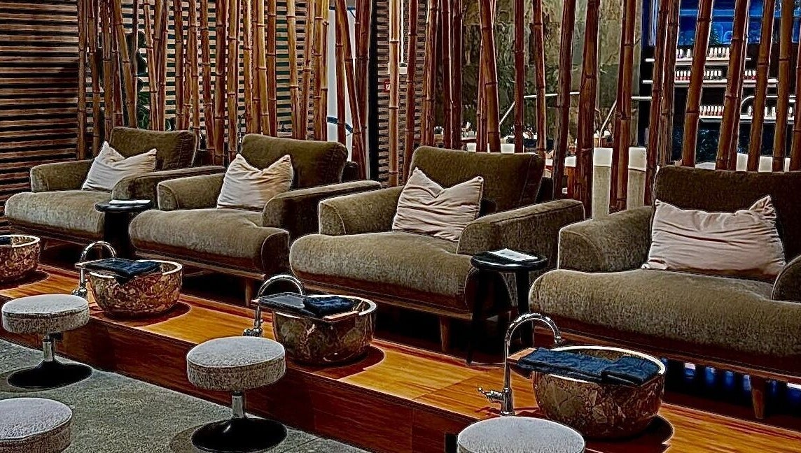 Luxurious pedicure seating at The Art of Nails Albany, Auckland, NZ, with elegant decor and comfortable chairs.