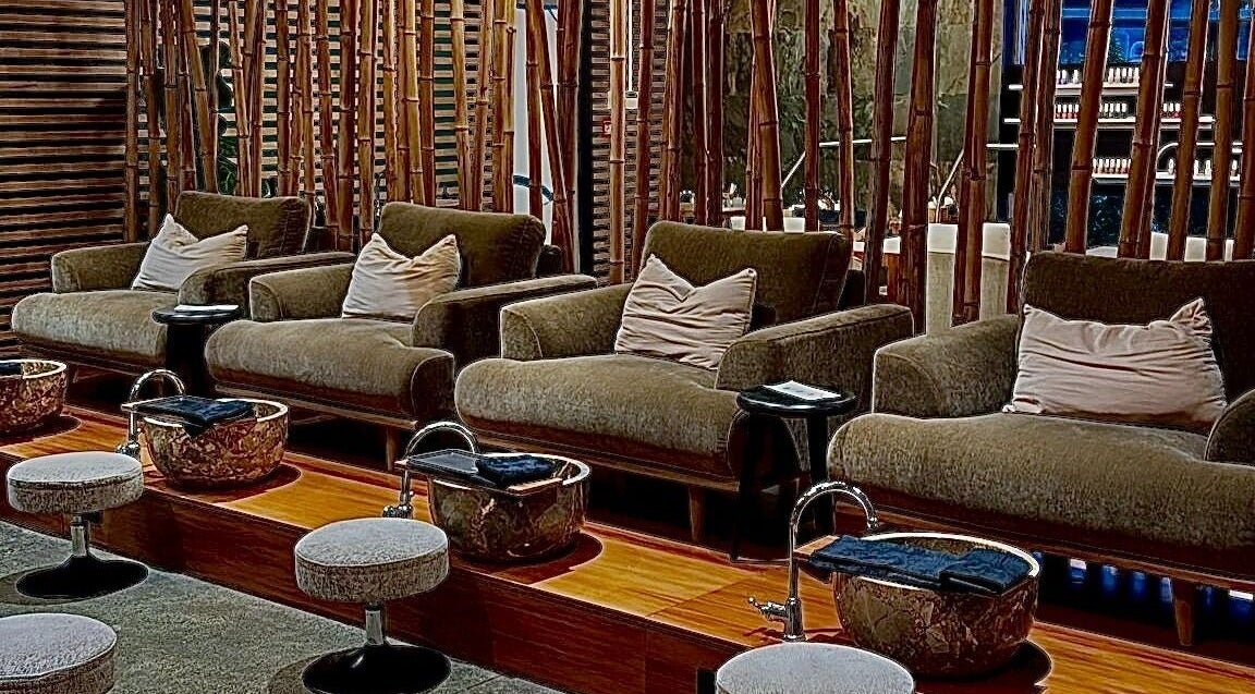 Luxurious pedicure seating at The Art of Nails Albany, Auckland, NZ, with elegant decor and comfortable chairs.