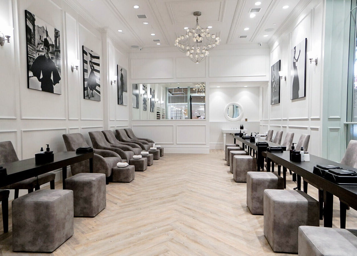 Luxurious interior of Naked Botanica by The Art of Nails Newmarket, Auckland, Auckland, NZ with plush seating.