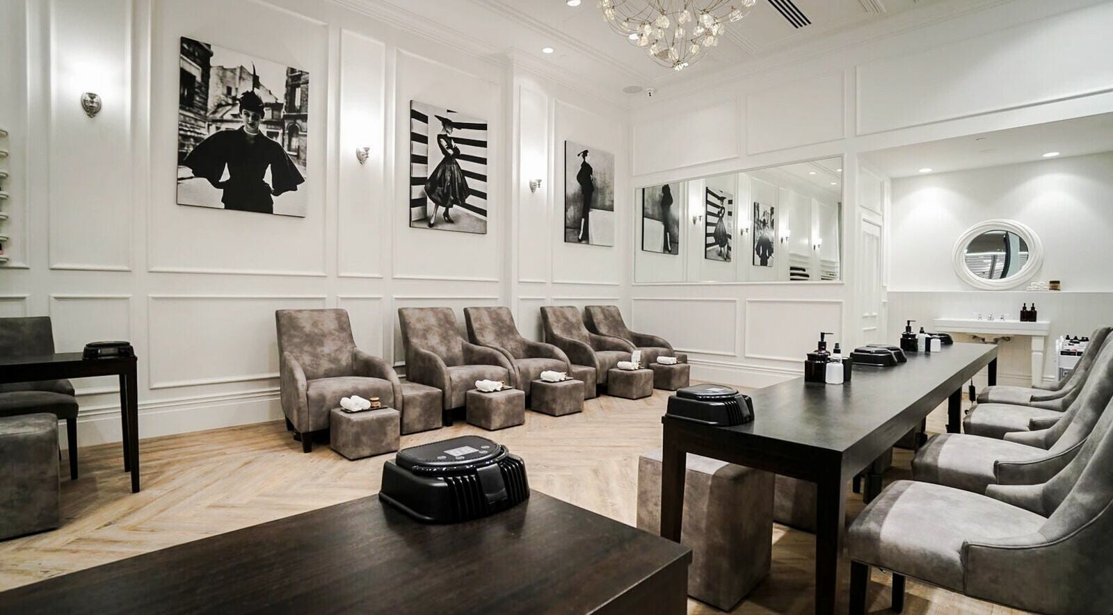 Chic interior of Naked Botanica by The Art of Nails Newmarket, Auckland, NZ, showcasing elegant seating and decor.