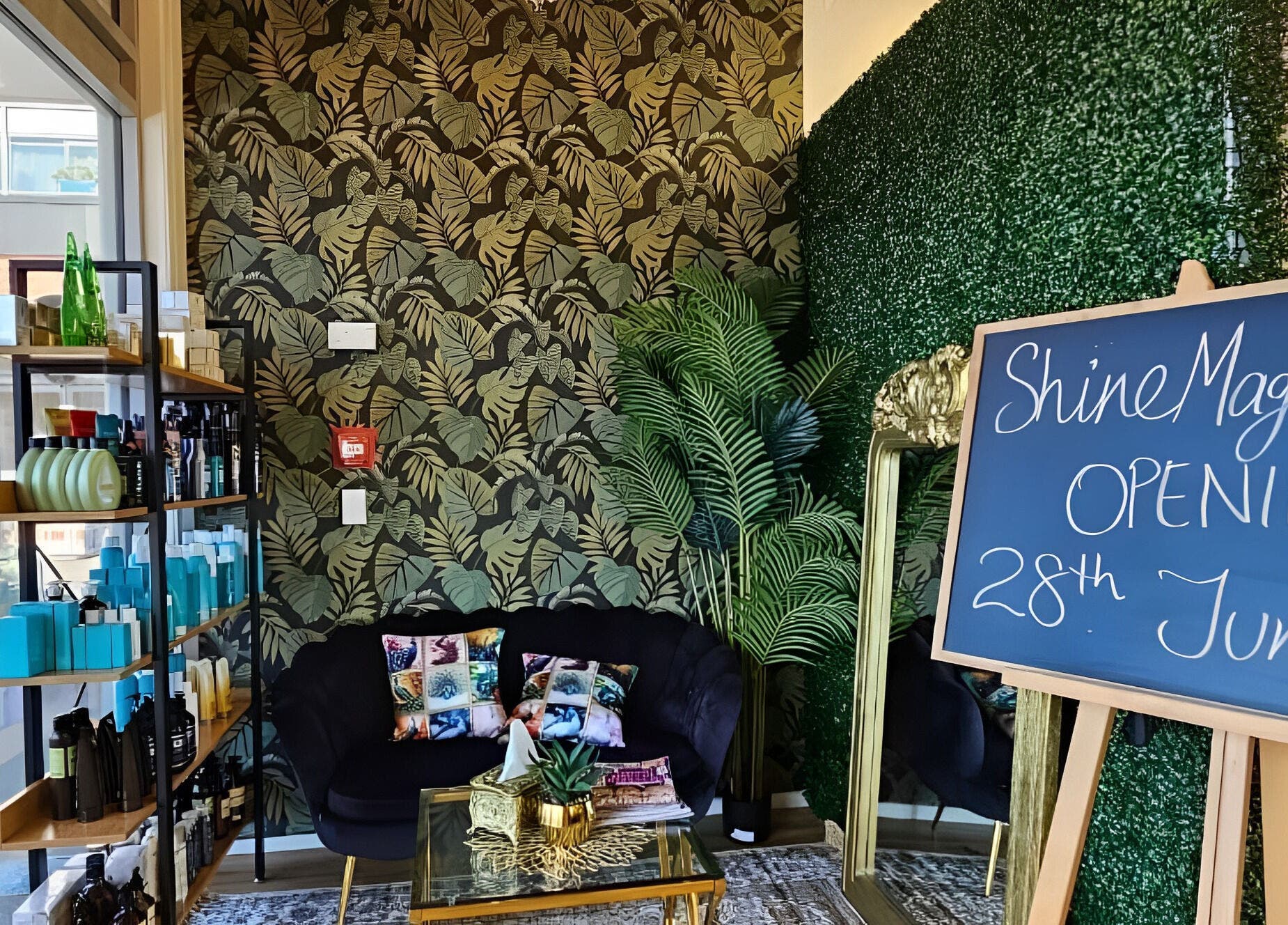 Chic interior at Shine Magic Touch Rototuna, Hamilton, Waikato, NZ with leafy decor and product display.