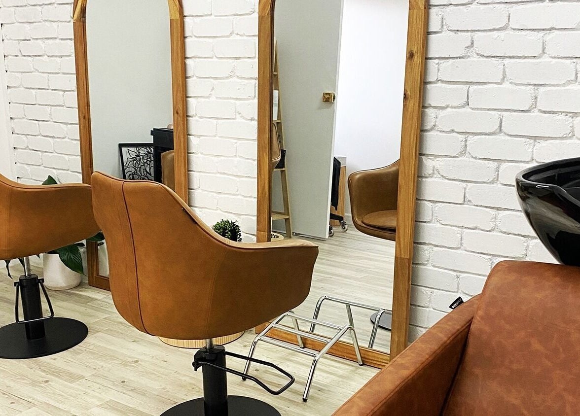 Elegant salon interior at Cakora Aesthetics - Maclean, featuring stylish chairs and mirrors in Maclean, New South Wales, AU.