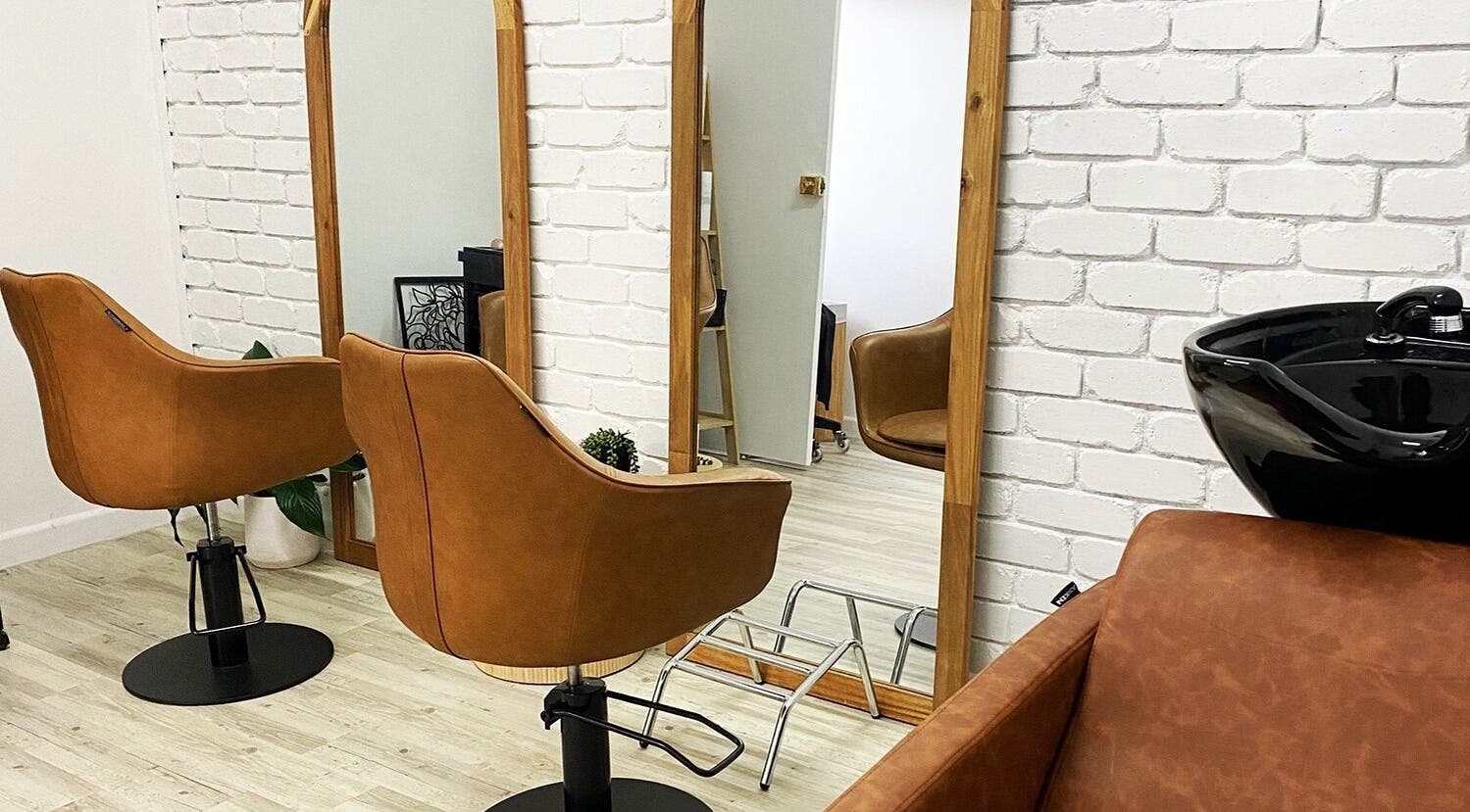 Elegant salon interior at Cakora Aesthetics - Maclean, featuring stylish chairs and mirrors in Maclean, New South Wales, AU.