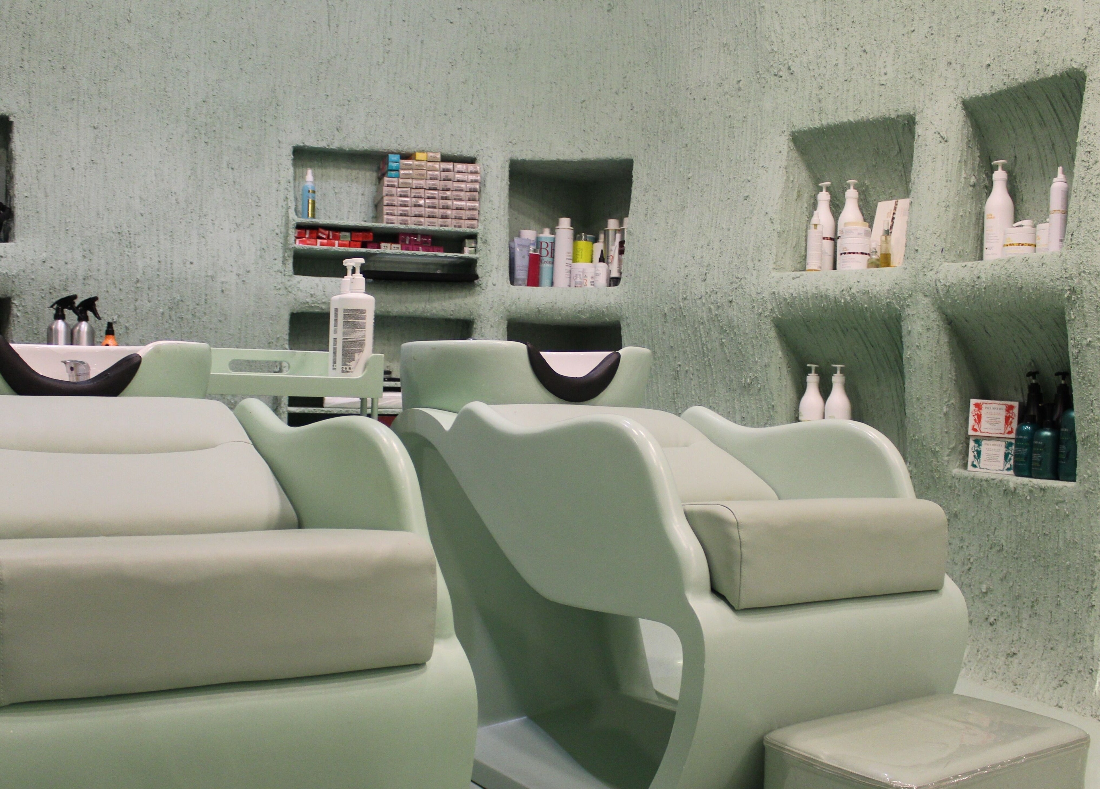 Luxurious wash station at Hide Beauty Center, Sharjah, Sharjah, AE, offering premium hair care services.