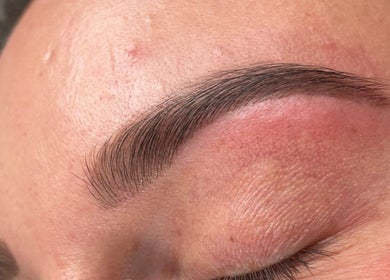 Groomed eyebrow after treatment at Glow By BG, Rotherham, England, GB showcasing precise arch.