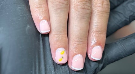Styled lemon nail art manicure at Glow By BG, Rotherham, England, GB, showcasing detailed hand-painted design.