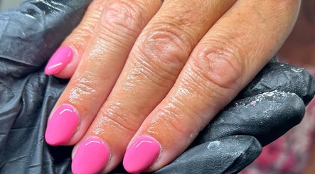 Vibrant pink manicure at Glow By BG, Rotherham, England, GB.