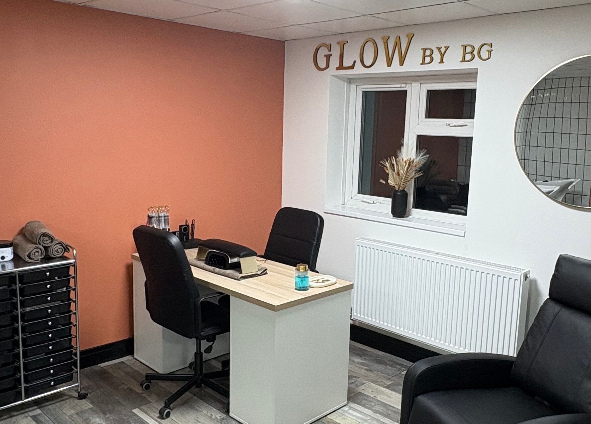 Cozy interior of Glow By BG in Rotherham, England, GB with a stylish desk and modern decor.