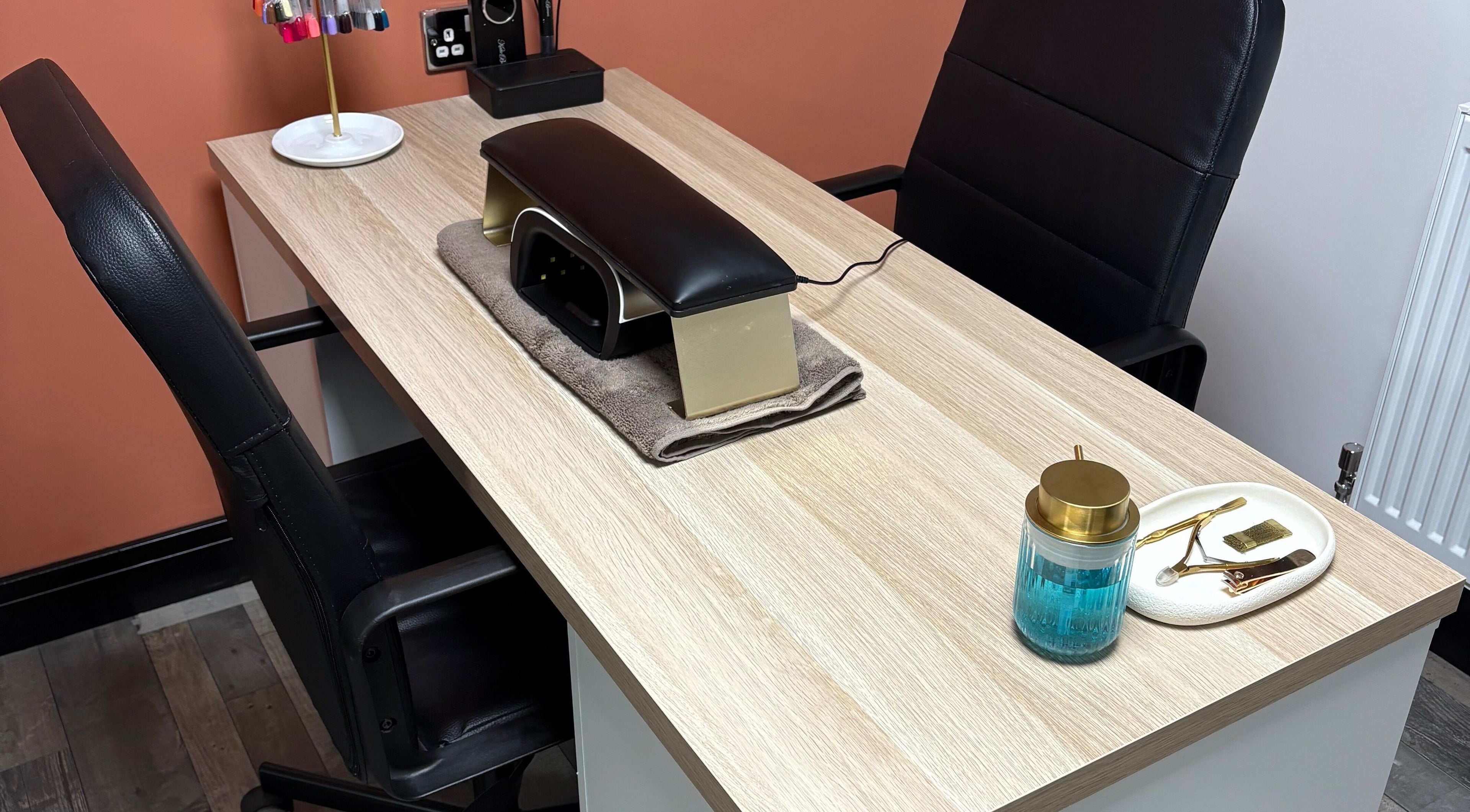 Manicure station at Glow By BG, Rotherham, England, GB, featuring sleek decor and modern tools.