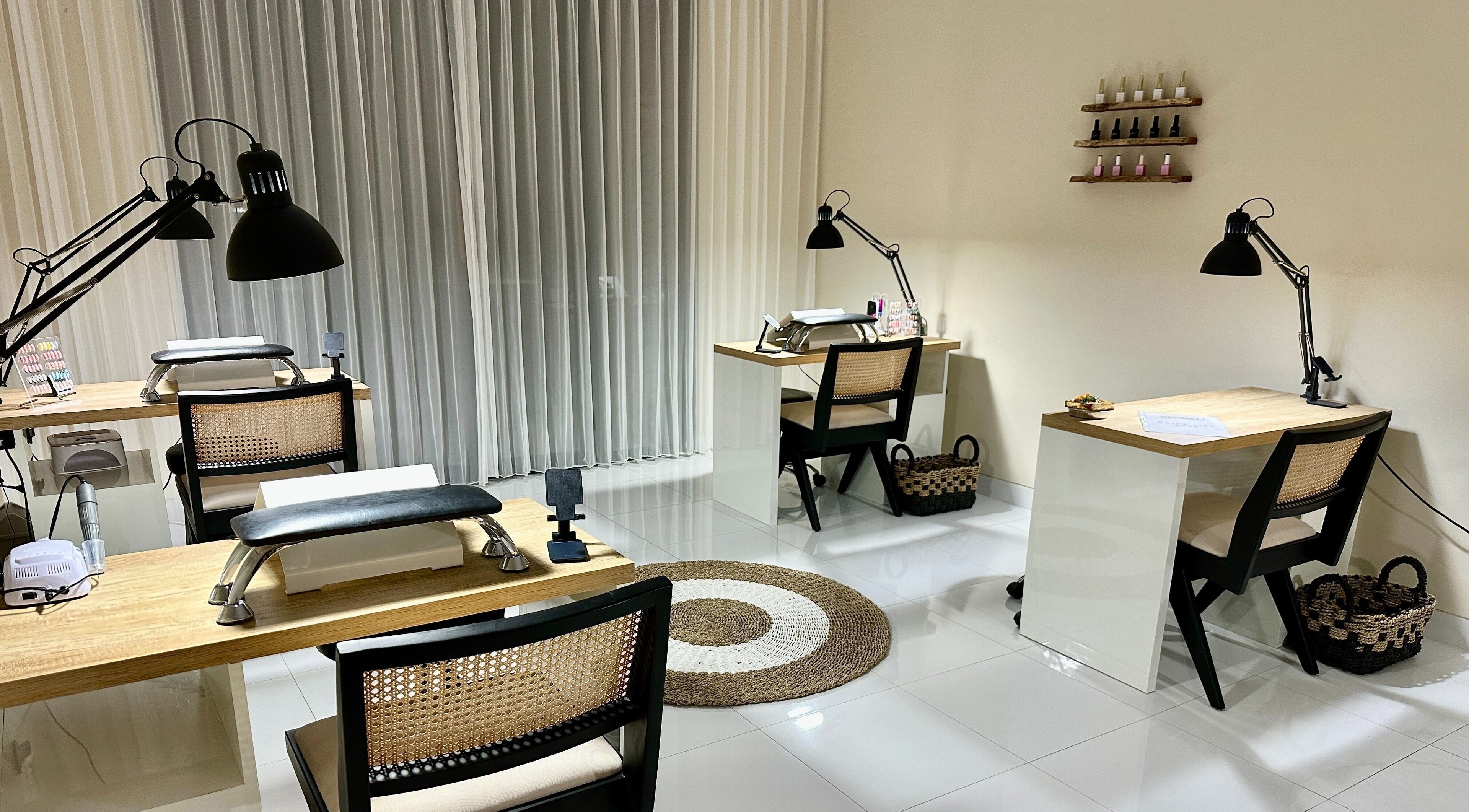 Elegant nail stations at Kembali Nails & Beauty Studio, Kab. Badung, Bali, ID, offering a serene spa experience.