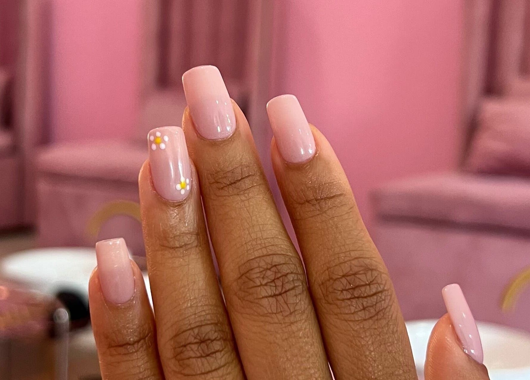 Stylish pink manicure with floral art at ROZÏÏ JŪ, East London, Eastern Cape, ZA.