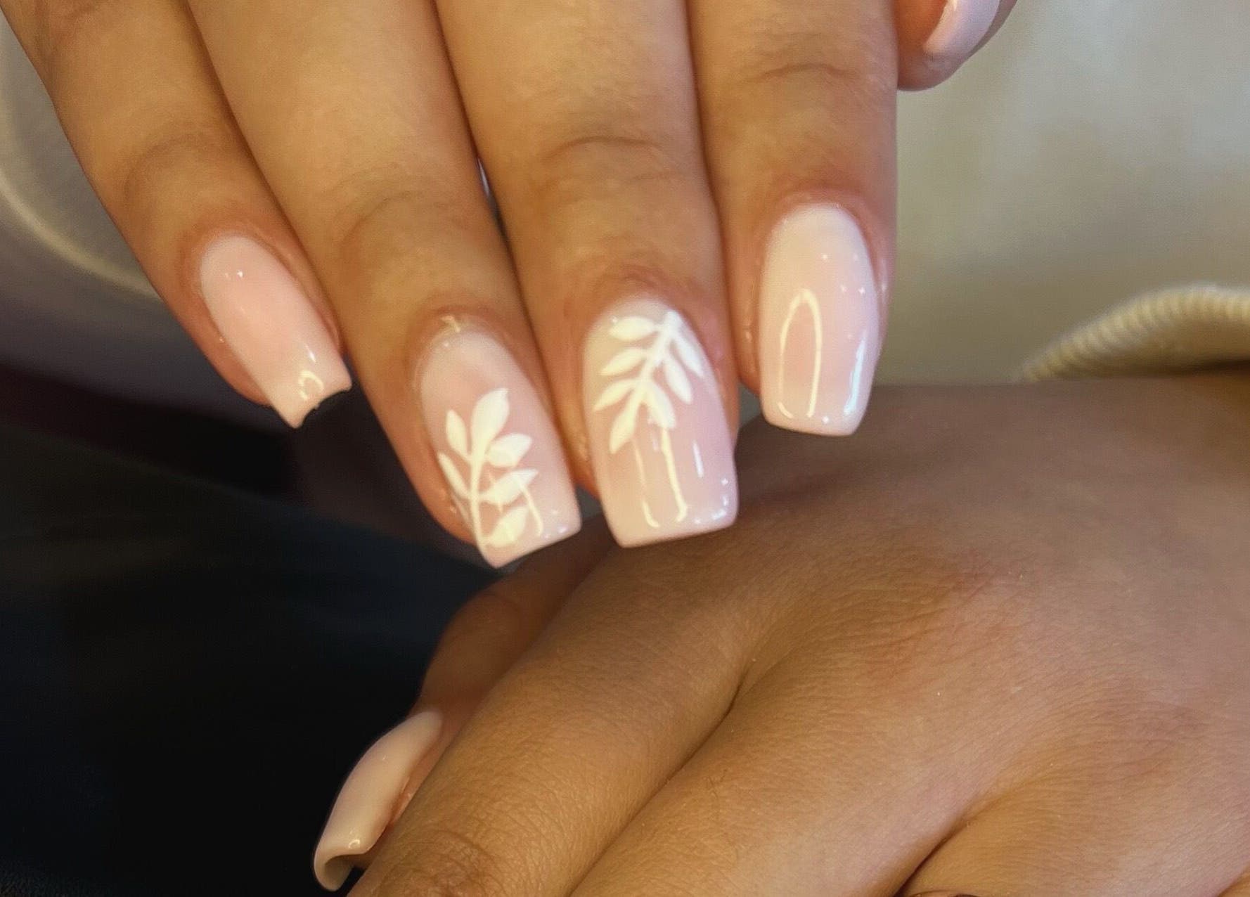 Stylish nail art design with leaf patterns at ROZÏÏ JŪ, East London, Eastern Cape, ZA.