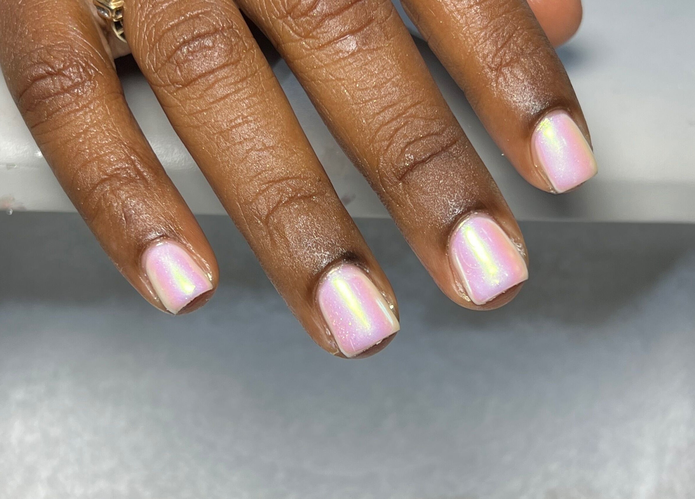 Stylish iridescent nails at Eddy_luxury, Portmore, St. Catherine Parish, JM for a chic look.