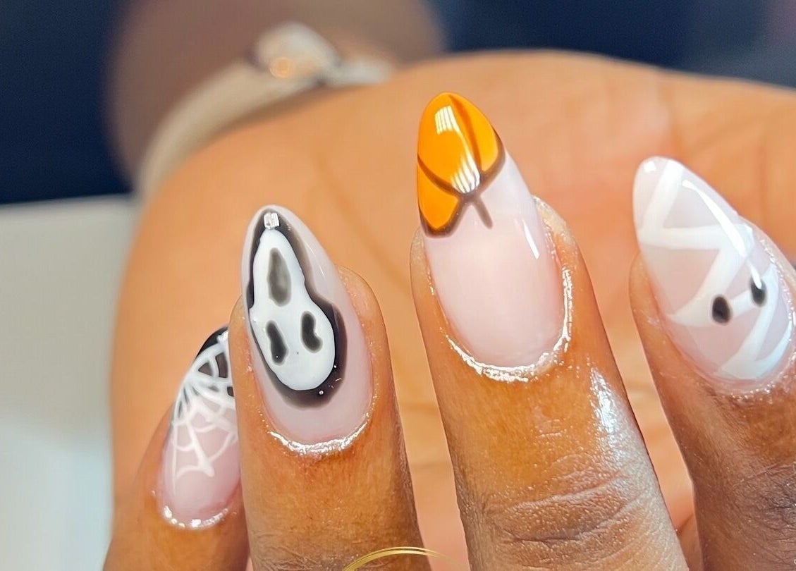 Stylish Halloween-themed nail art at Eddy_luxury, Portmore, St. Catherine Parish, JM.