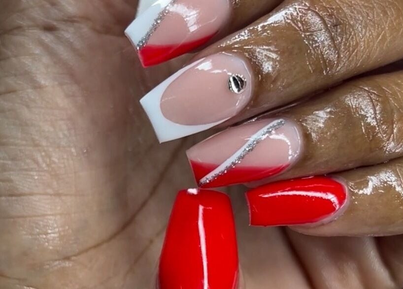Elegant red and nude nails with rhinestone design at Eddy_luxury, Portmore, St. Catherine Parish, JM.