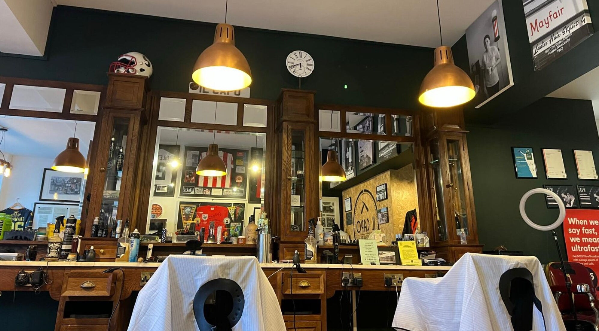 Elegant interior of Il Capo Barbiere in Newcastle-under-Lyme, England, GB showcasing vintage barber chairs.
