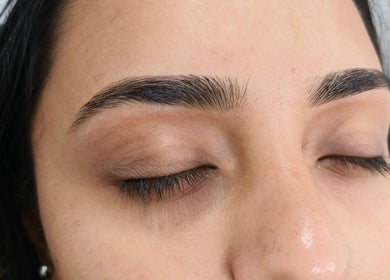 Close-up of perfectly groomed brows at Bliss Brow & Beauty Bar, Melbourne, Victoria, AU.