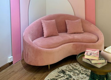 Elegant pink couch and table at SHAPE ON, Dubai, Dubai, AE, enhancing the stylish beauty ambiance.