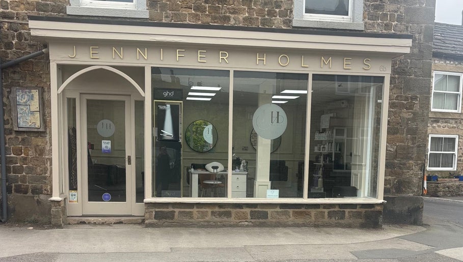 Front view of Kim A Hair salon located in Masham, England, GB, showcasing its stylish storefront.