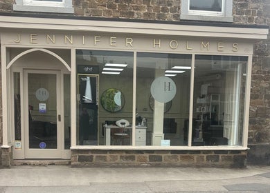 Front view of Kim A Hair salon located in Masham, England, GB, showcasing its stylish storefront.