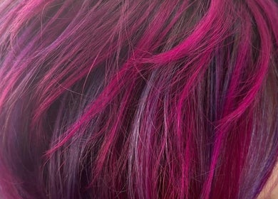 Stunning pink and purple hair color at Kim A Hair, Masham, England, GB, showcasing vibrant styling artistry.