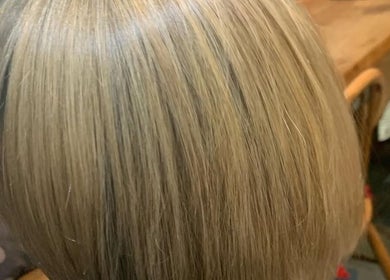 Elegant blonde bob hairstyle at Kim A Hair, Masham, England, GB, showcasing sleek styling.