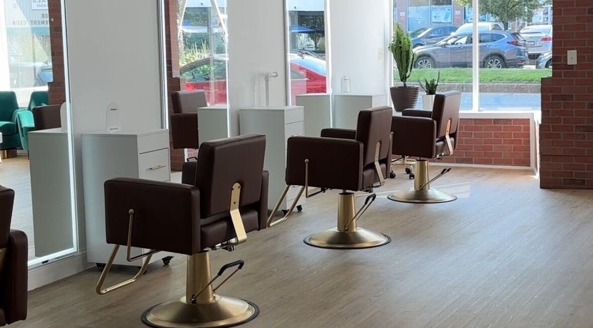 Modern salon chairs at Prado Beauty, Worcester, Massachusetts, US, offering a luxurious styling experience.