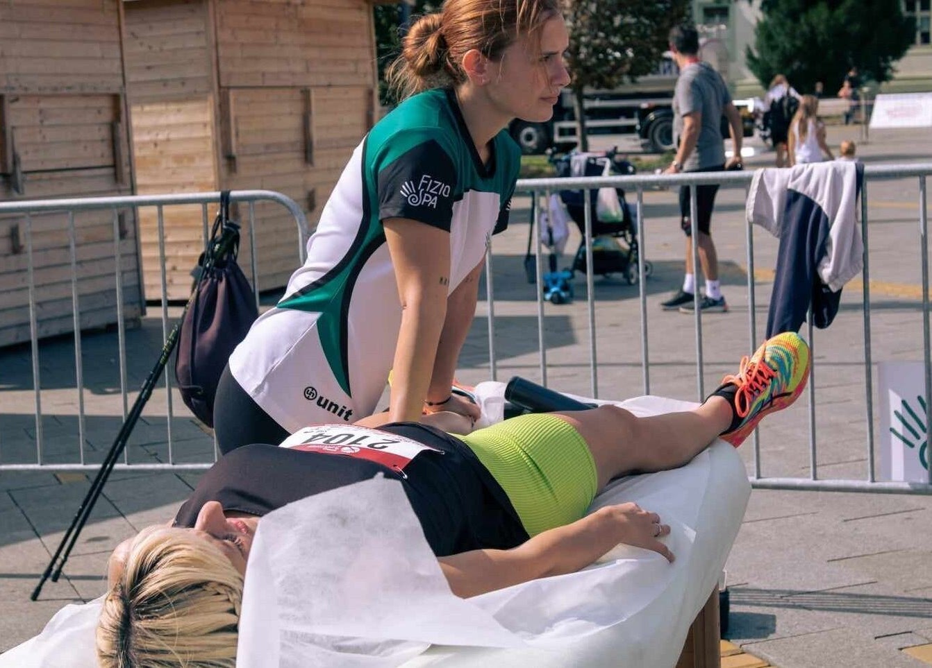 Therapist at Physio Spa- Fizio Spa in Zrenjanin provides outdoor massage therapy session.