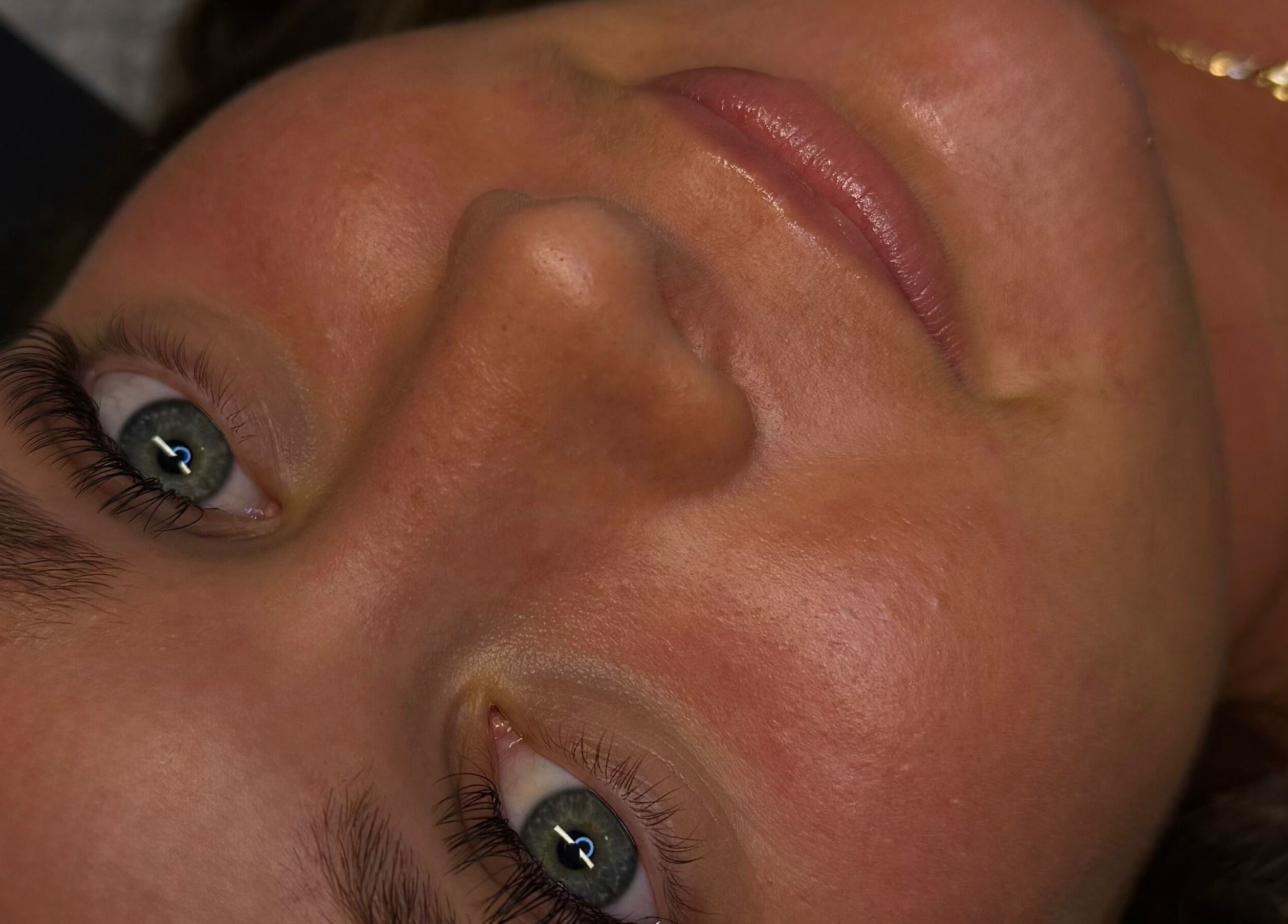 Close-up of relaxed client at Dlux Beauty Bar in Laidley, Queensland, AU, showcasing smooth and glowing skin.