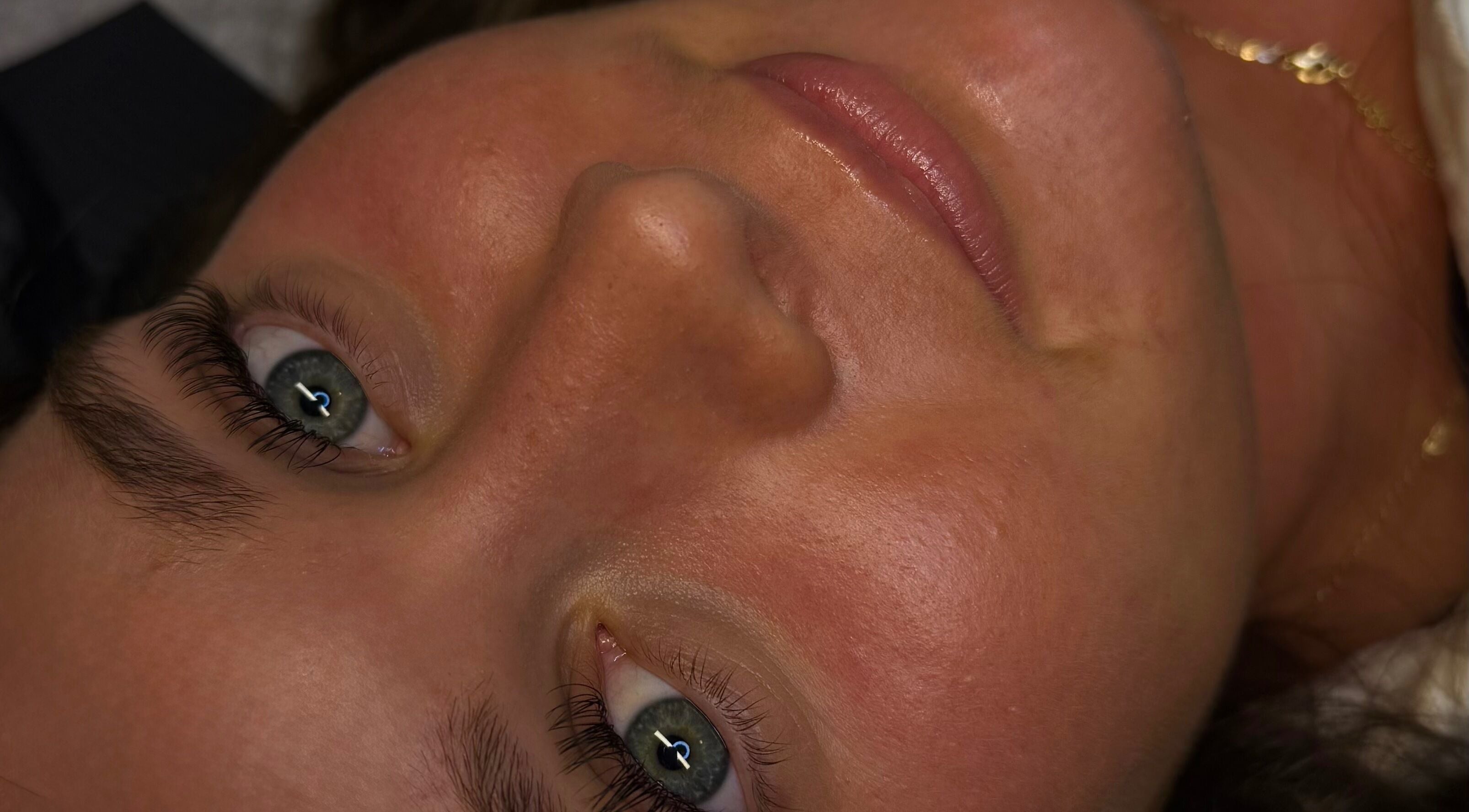 Close-up of relaxed client at Dlux Beauty Bar in Laidley, Queensland, AU, showcasing smooth and glowing skin.