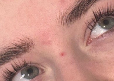 Close-up of expertly shaped eyebrows and lush lashes at Beauty By Poppy Marina, Bury, England, GB.
