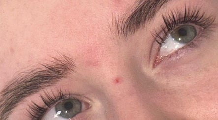 Close-up of expertly shaped eyebrows and lush lashes at Beauty By Poppy Marina, Bury, England, GB.