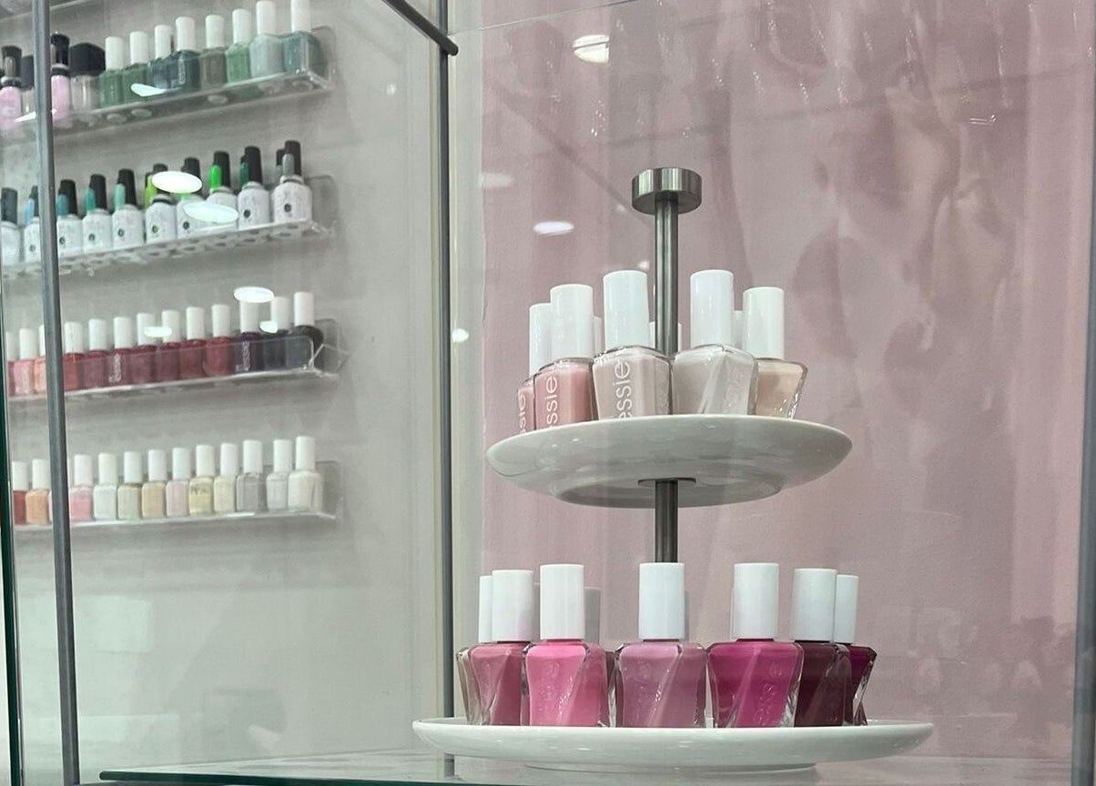 Nail polish display at The Pinky Beauty Lounge, Abu Dhabi, AE showcasing vibrant shades.
