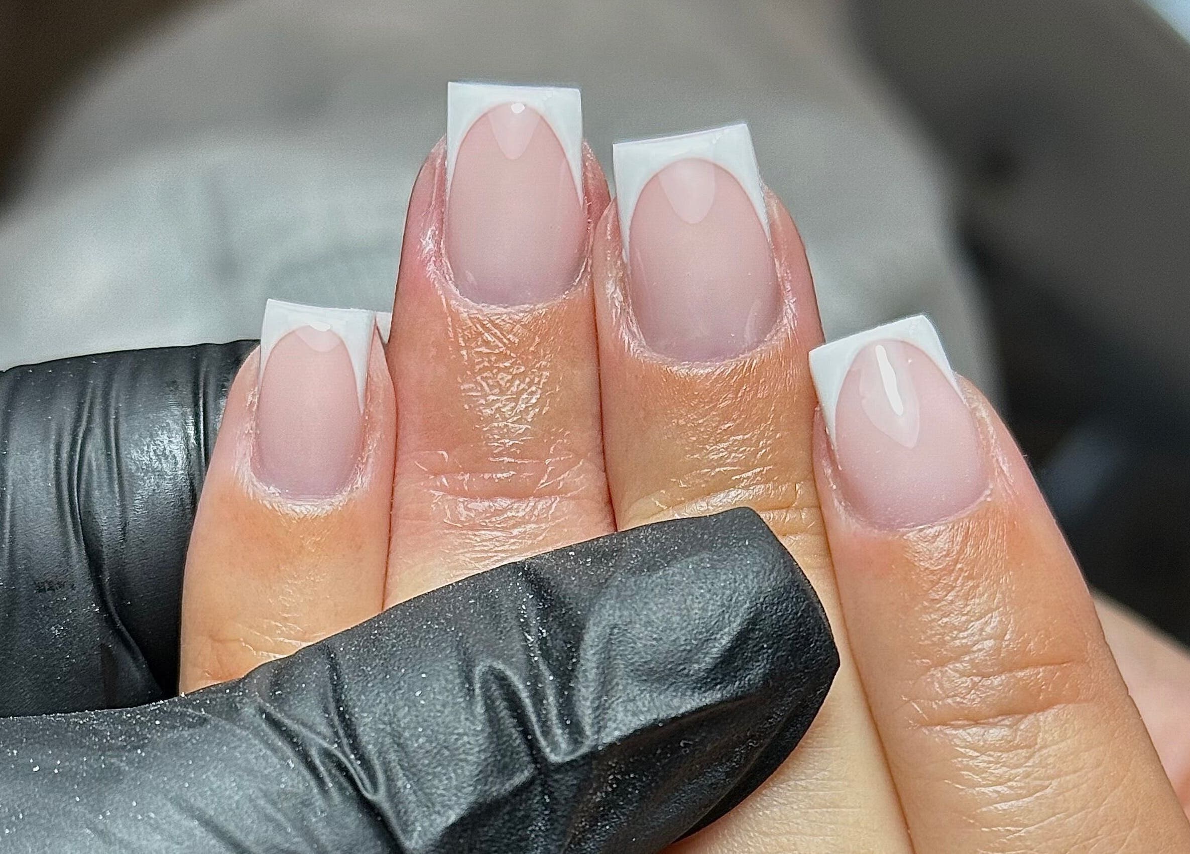 French manicure at Nailssby.han in Heywood, England, GB, showcasing glossy square nails.